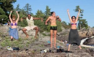Four people jumping
