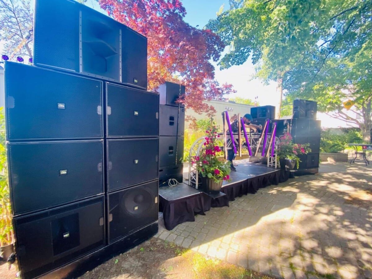 A speaker and stage setup outside