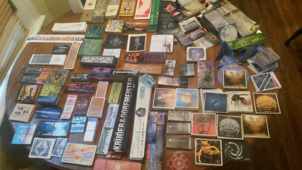 A table of event flyers such as Kruder & Dorfmeister
