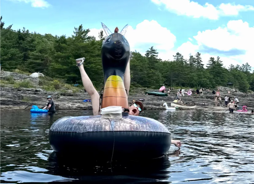 Woman joking in floatie