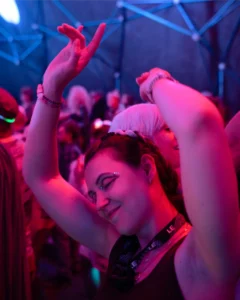 Happy dancer smiling from side