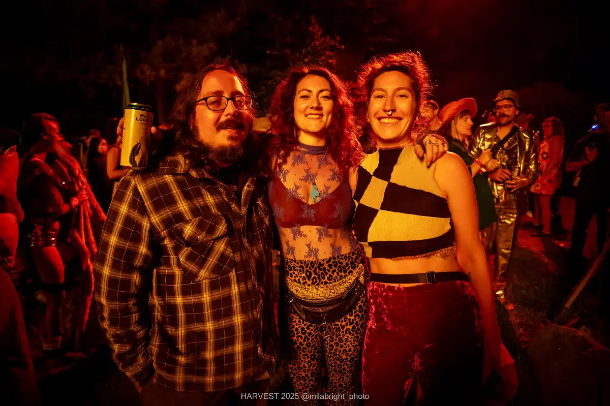 Three friends by the bonfire