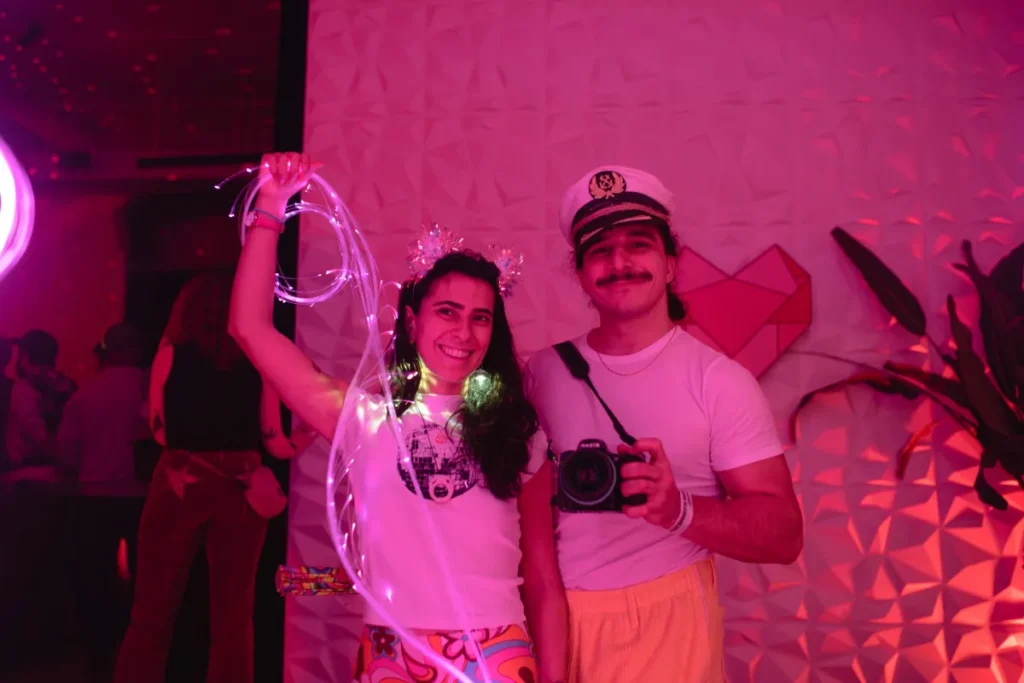 Couple with glow cord and camera