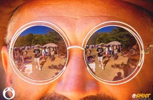 Close up of face with stache and sunglass reflection of path