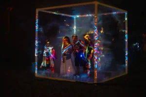 A misty cube with people