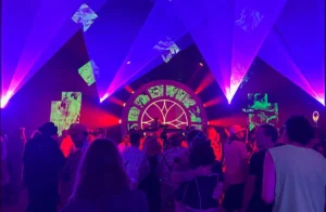 Harvest festival 2026 photos: Crowd dancing under colorful lights and stage visuals.